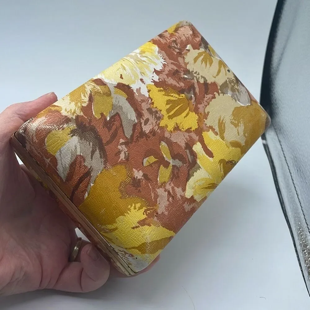 Vintage 70’s pierced earrings case. Golden rod floral print.